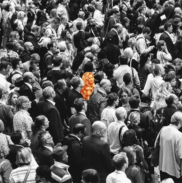 Single person highlighted in a crowd